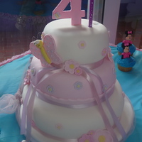 Flowers And Butterflies My daughter's 4th birthday. She loved it All Fondant.