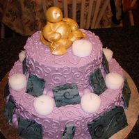 Budah Cake My sister and I love yoga so I call this our Namaste cake. It is a two tier cake with buttercream icing. I made the Budah out of fondant...