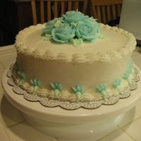 Img_1191.jpg I think this was the 4th or 5th cake I made. I was practing my roses for my final class cake.