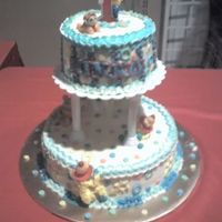 1 Year Old Birthday Colourful cake for a baby boy - 6" and 10" orange butter cakes.