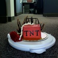 Tnt It's Dynomite! Spicy mexican chocolate cake that I made for my office's chili cook off. My first attempt using fondant.