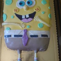 Spongebob i made this cake for my nephew, its made with mmf inside white cake with chocolate custrard filling