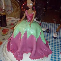Aisha (Winx) Cake The background is messy, but we had a party the night before and I promised my God Daughter this cake for her party. The lower cake is a...