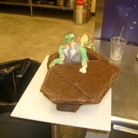 Zombie Coffin Cake I made this for a work spooky cake contest. The coffin is made from chocolate and yellow cake mix; american buttercream and covered in...