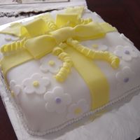 Fondant Gift Cake This was my first attempt at using fondant. It was for the Wilton Course 3. I can see a lot of things I would do differently but all in all...