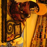 The Nightmare Before Christmas Stacked Tiers, carved "roads, made moon and hill from chocolate, also trees and words, my kids and mine favorite movie