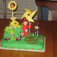 Teletubbies Cake This was for my son's first birthday, he just loved it. The Teletubbies and bunnies are made of fondant and the rest is buttercream. I...
