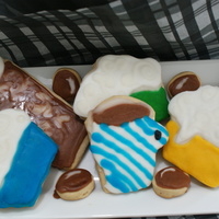 Coffee & Cuppies coffee, coffee beans, and cuppie sugar cookies all decorated with royal Icing