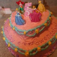 Princess_Cake.jpg I made this cake by stacking a small heart shaped cake onto a large heart shaped cake and decorated using Disney Princess colors and...