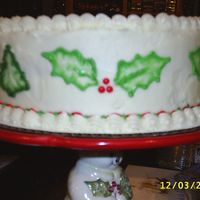 Simple Holly This was actually a 1st Birthdya cake for someone I know. It was at Christmas time.