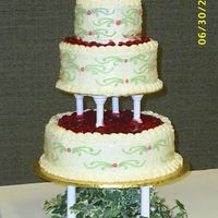 Black Forrest Style Wedding Cake I made this for a friend. It's a dark chocolate cake with cherry filling and white chocolate frosting. I have also used a white...