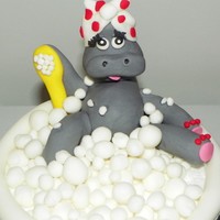 Retirement Retirement cake. Maisie Parrish design just made the hippo and spa she didnt want all the extra trimmings around the cake.