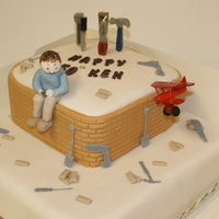 Bricks N Bobs this cake was made to order. The customer is a builder and flies As most of his flights end up in a crash i thought this would be amusing....