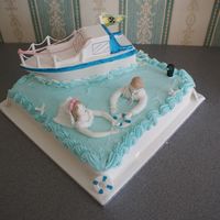 Overboard And In Love 12 inch square fruit. made to order replica of grooms boat called wrecklesshense couple and box floating in water. A gift from bestman