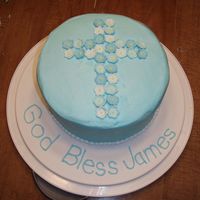 Baptism Cake This was for my nephew's baptism. It was my first time making flowers from gumpaste.