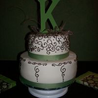 Sweet 16 Birthday Cake White fondant with chocolate scroll work. White chocolate cake with Nutella ganache filling.