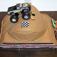 Monster Jam Monster Jam cake, chocolate chocolate chip cake with chocolate buttercream icing, fondant accents.