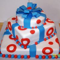 Giftcake2.jpg Gift box cake, made for school fundraiser auction, my first cake done with fondant.