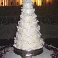 Ornate Cake 7 tiers, Chocolate Hershey's cake with chocolate ganache filling, swiss buttercream icing, sugar flowers, grape clusters and fondant...