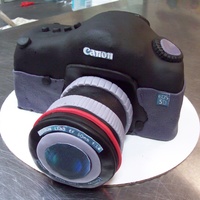 Canon Camera Cake This was for a bridal shower and the bride was a photographer. Her sister wanted to surprise her with a "camera cake"!