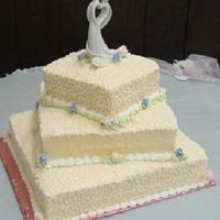 Square Wedding Cake This was the first time I tried gumpaste / fondant flowers like this. I had fun making them. Everything else is gumpaste / fondant...