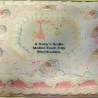Baby Shower Girl 11"X15" Sheet Cake With Butter Cream Frosting. Stork and Baby Printed On Frosting Sheet. Fondant Booties Made From Chocolate Mold...