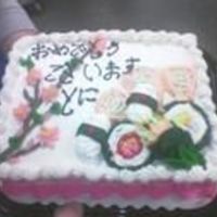 Sushi sushi themed birthday cake- i tried to write happy birthday in japanese, my cousin told me later i wrote it wrong oh well :(