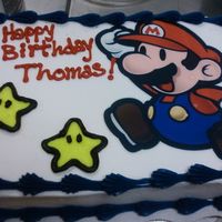Mario birthday cake, i kinda cheated though-mario is printed on edible image paper