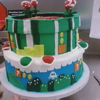 Mario World a copy of the wedding cake made by Gateaux inc. made for a boys birthday- i only got to use fondant for the flower things on top, the whole...