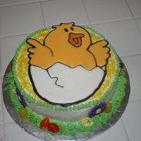 Easter Cake A 8 inch cake covered with Pastry Pride and topped with a Color Flow chick