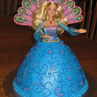 Barbie Island Princess Doll Cake This is my first doll cake! My daughter wanted a Barbie Island Princess themed cake for her 5th b-day. I used the Wilton Wonder Mold cake...
