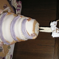 My First Wedding Cake! I made my first wedding cake for a neighbor's daughter this June. It was casual beach themed wedding. They didn't need a big cake...