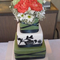 "ruth" A four tier cake I made for a friend's wedding reception this summer. 4", 6", 8" and 10" square tiers of lemon...