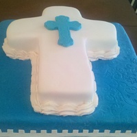 First Communion Cake 18" square and 14"cross cakes. French Vanilla, filled with chocolate mousse, iced in buttercream and covered in fondant. TFL