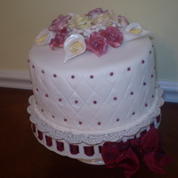 Maria's Bridal Shower Vanilla Chiffon Cake with Lemon Curd filling covered in fondant with gum paste flowers.