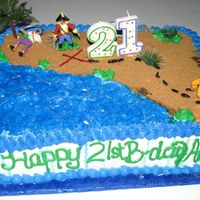 Pirate Cake This was a pirate cake for my couosins 21st bday. The water is blue jello and the sand is brown sugar.
