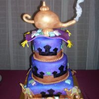 Arabian Nights My first airbrush cake. I also made my own stencils for it. Chocolate gems and fondant camels. Everything is edible except for the lamp.