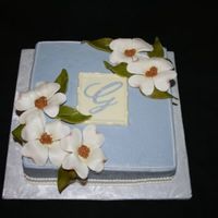 Dogwoods For an Easter birthday. Gumpaste dogwoods; fondant leaves, painted for color variation; White Chocolate monogram plaque. I didn't have...