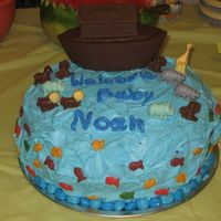 Noahs Ark Noahs Ark cake made for a baby shower. 12" round, 3 layer, white cake filled with strawberries. Ark and animals are chocolate,...