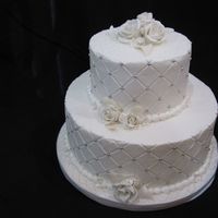 All White On White Bridal Shower Gumpaste roses and buttercream frosting on a chocoate cake w/strawberry filling