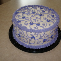 Sample Cake 8 " round, buttercream icing and decorations with dragees and fondant accents. Thanks for looking.
