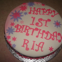 Pink Purple 1St Birthday Cake An all fondant cake for a little girl's first birthday