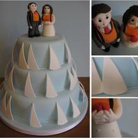 Sailing Wedding Cake This couple met whilst dinghy sailing and they wanted their wedding cake to reflect this so each tier was decorated with sails and the...