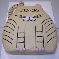Cat Cake For Bren's Birthday This is a cake I made for a friend's birthday. I used the Wilton large oval pan, cut one end off and used that part for the ears. The...