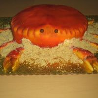 Have A Crabby Birthday 3D crab, covered in fondant and airbrushed. Claws are made from fondant also.