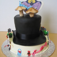 Alice Inspired by "Alice in Wonderland" Fondant hat, with some buttercream and fondant deco.