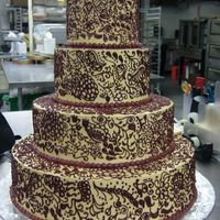 Henna Indian Wedding cake done for an Indian couple at work. They wanted the whole cake to show the traditional henna design worn on the bride's...