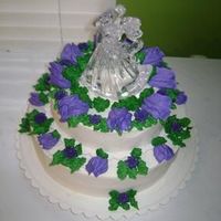 Simple Wedding Cake mexican vanilla wedding cake with indydebi's frosting. violet rose buds.