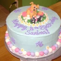 My New Favorite Childrens Cake! Strawberry cake with indy debbie's buttercream (i used a half cup of butter though) Decorations are all handmade with a 50/50 fondant...