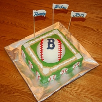 Baseball Birthday Cake Buttercream base, fondant covered baseball and accents.